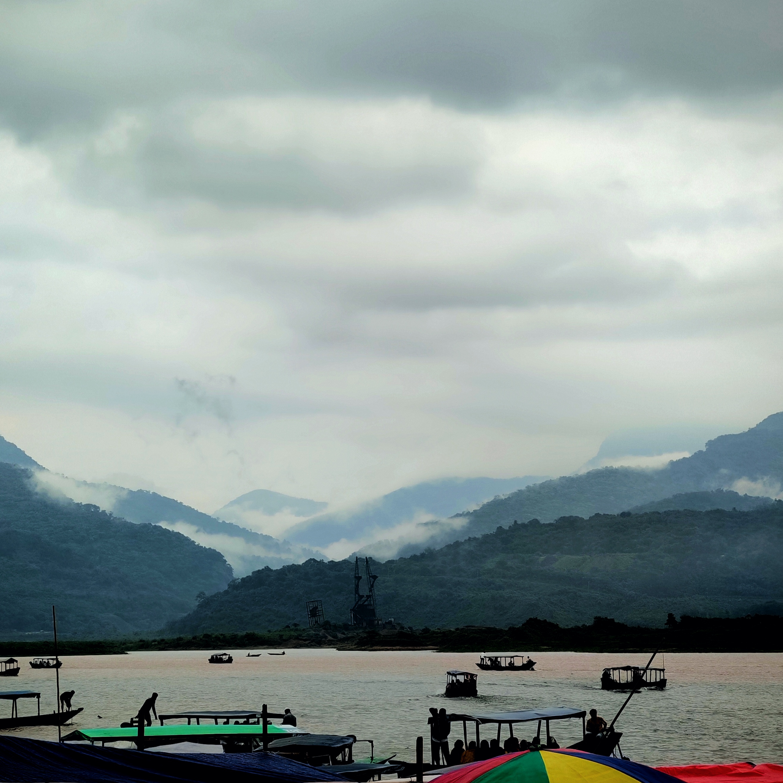 Winter breath on the river, mist dancing through the hills